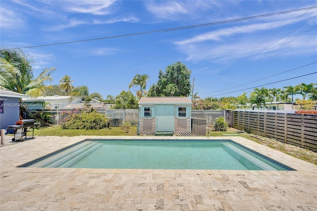 3338 Cleveland St, Hollywood, FL 33021 - view of swimming pool with a storage unit, a fenced backyard, and a patio area