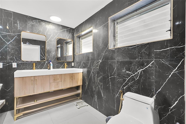 3338 Cleveland St, Hollywood, FL 33021 - bathroom featuring tile walls, double vanity, and tile patterned flooring