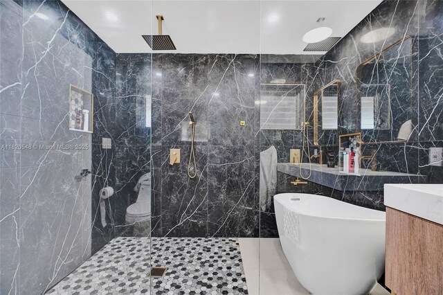 3338 Cleveland St, Hollywood, FL 33021 - bathroom featuring tile walls, a freestanding tub, a marble finish shower, and vanity