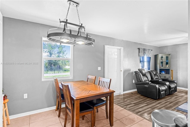 2818 W 66th St, Lehigh Acres, FL 33971 - dining space featuring light tile patterned floors