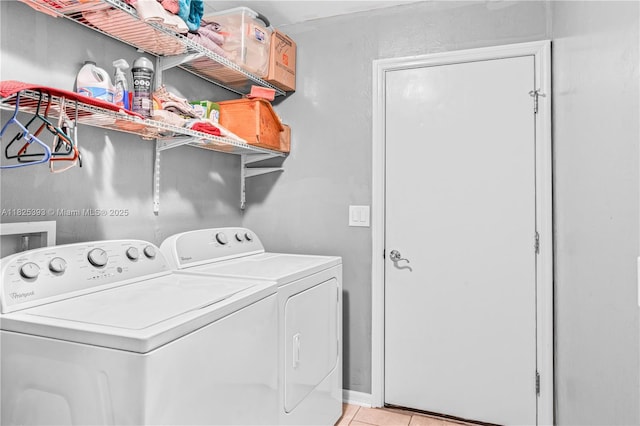 2818 W 66th St, Lehigh Acres, FL 33971 - washroom featuring independent washer and dryer and light tile patterned floors