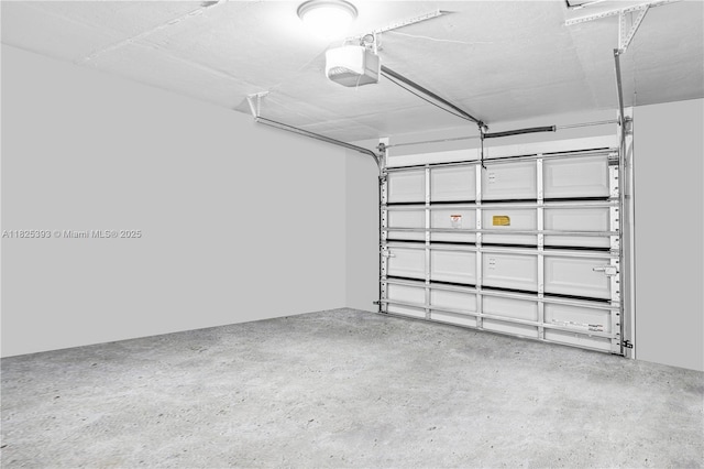 2818 W 66th St, Lehigh Acres, FL 33971 - garage featuring a garage door opener