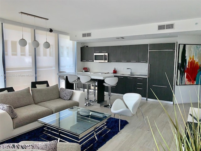 55 SW 9th St Unit 2706, Miami, FL 33130 - living area with light wood-type flooring