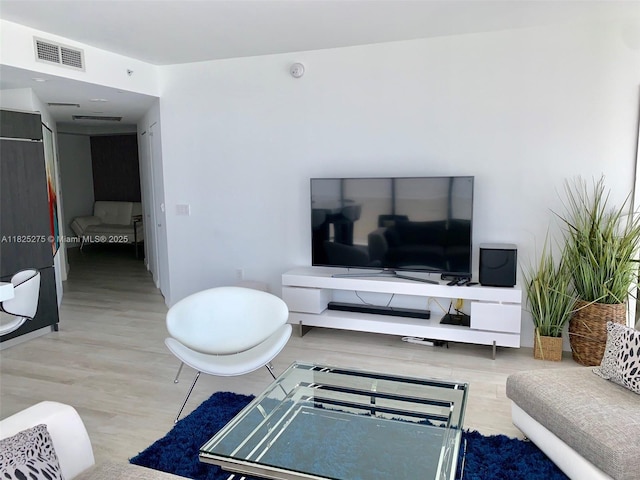 55 SW 9th St Unit 2706, Miami, FL 33130 - living room featuring wood finished floors