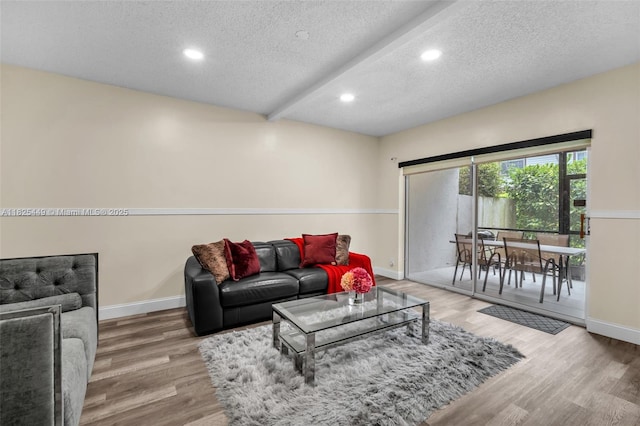 11664 NW 19th Dr, Coral Springs, FL 33071 - living room with a textured ceiling, wood finished floors, recessed lighting, and beam ceiling