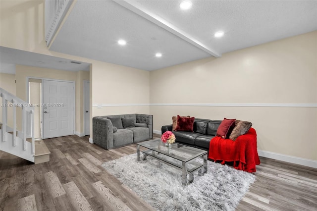 11664 NW 19th Dr, Coral Springs, FL 33071 - living room featuring wood finished floors, stairway, a textured ceiling, and recessed lighting