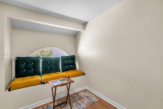 11664 NW 19th Dr, Coral Springs, FL 33071 - living area with wood finished floors and a textured ceiling