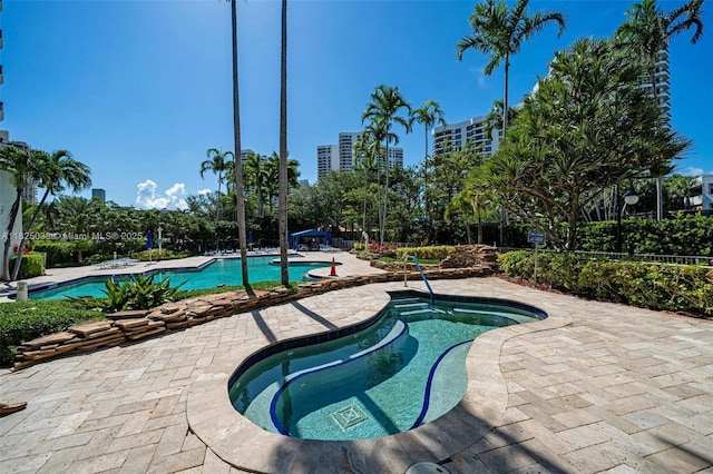 3500 Mystic Pointe Dr Unit 1702, Aventura, FL 33180 - community pool with a patio