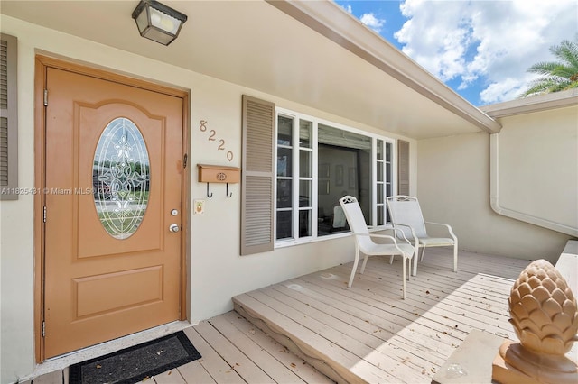 8220 NW 24th Ct, Pembroke Pines, FL 33024 - view of exterior entry featuring stucco siding