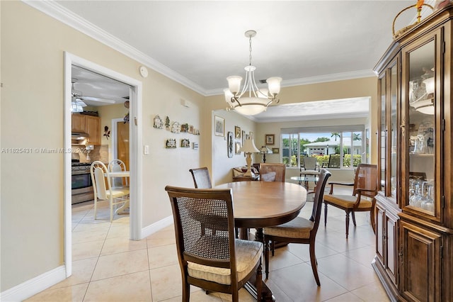 8220 NW 24th Ct, Pembroke Pines, FL 33024 - dining room with ornamental molding, a chandelier, and light tile patterned floors
