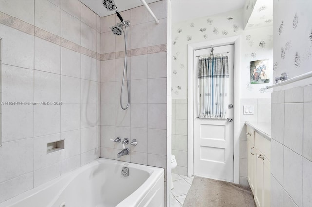 8220 NW 24th Ct, Pembroke Pines, FL 33024 - bathroom with tile walls, shower / tub combination, vanity, wainscoting, and wallpapered walls