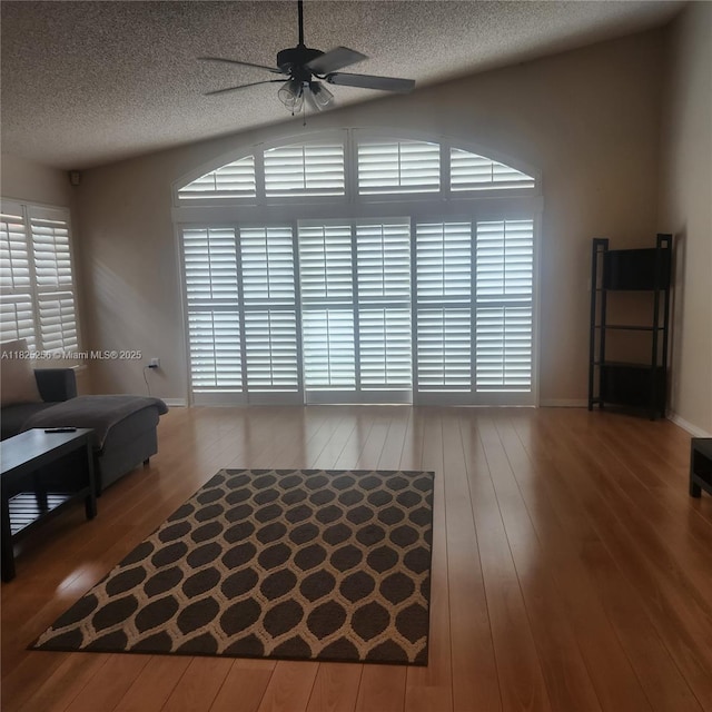 2017 NW 182nd Ave, Pembroke Pines, FL 33029 - living area featuring ceiling fan, wood-type flooring, and a textured ceiling