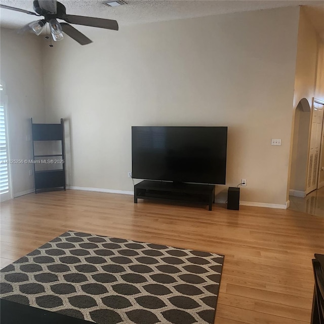 2017 NW 182nd Ave, Pembroke Pines, FL 33029 - living area with light wood-type flooring, a ceiling fan, and arched walkways