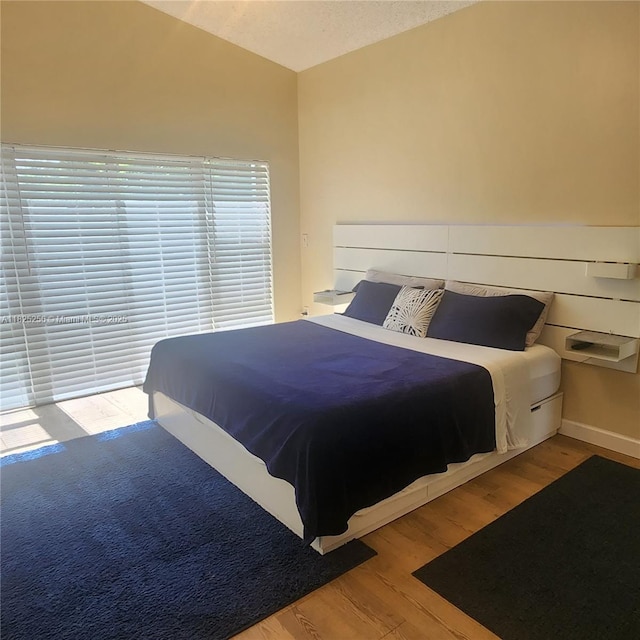 2017 NW 182nd Ave, Pembroke Pines, FL 33029 - bedroom featuring wood finished floors and lofted ceiling
