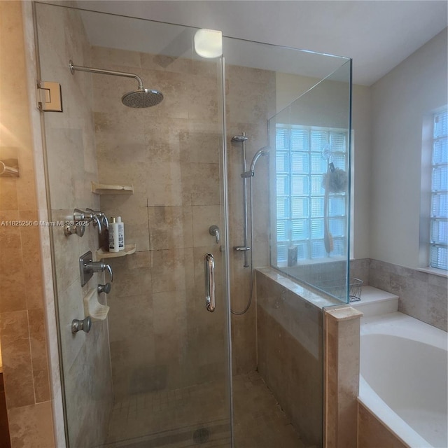 2017 NW 182nd Ave, Pembroke Pines, FL 33029 - bathroom with a garden tub and a stall shower