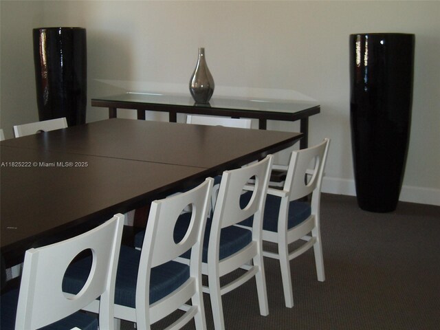 18800 NE 29th Ave Unit 730, Aventura, FL 33180 - dining room featuring carpet flooring and baseboards