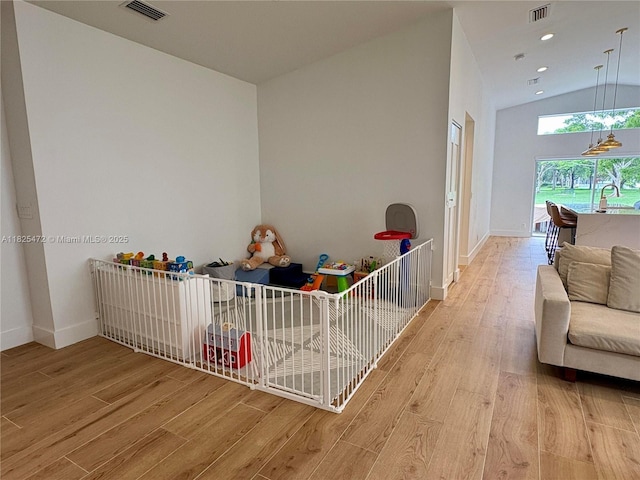 2091 SW 157th Ave, Miramar, FL 33027 - rec room featuring wood finished floors and vaulted ceiling