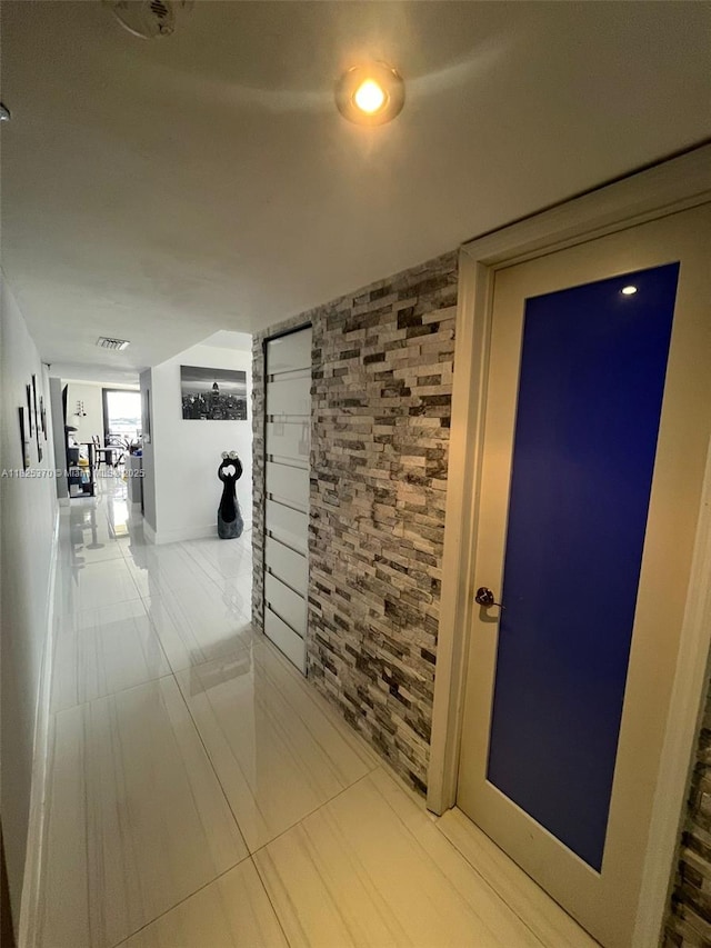 17878 N Bay Rd Unit 507, Sunny Isles Beach, FL 33160 - hallway featuring tile patterned flooring