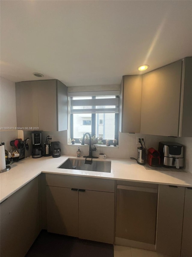 17878 N Bay Rd Unit 507, Sunny Isles Beach, FL 33160 - kitchen featuring gray cabinetry, light countertops, recessed lighting, and modern cabinets