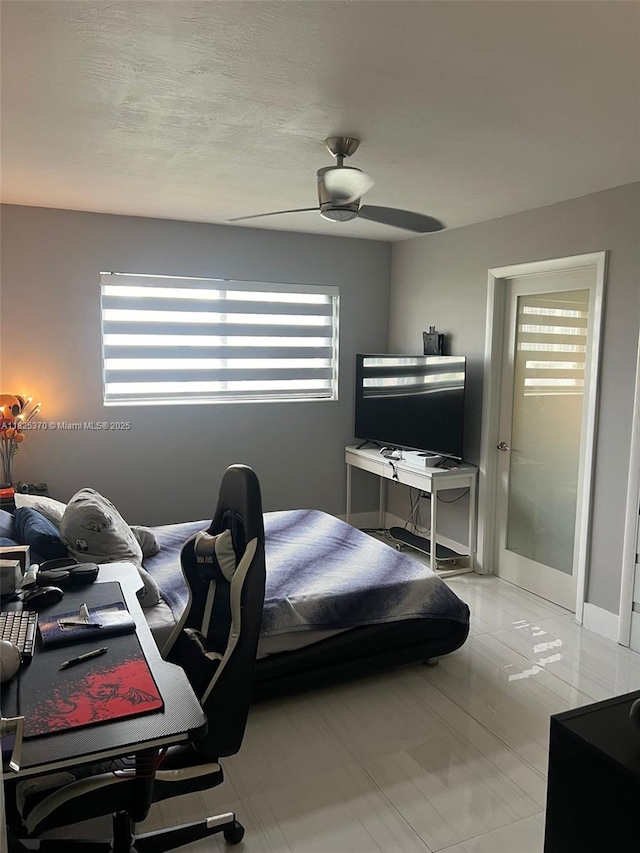 17878 N Bay Rd Unit 507, Sunny Isles Beach, FL 33160 - bedroom featuring multiple windows and a ceiling fan