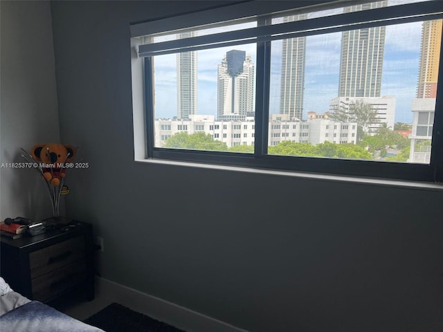 17878 N Bay Rd Unit 507, Sunny Isles Beach, FL 33160 - bedroom featuring multiple windows and a view of city