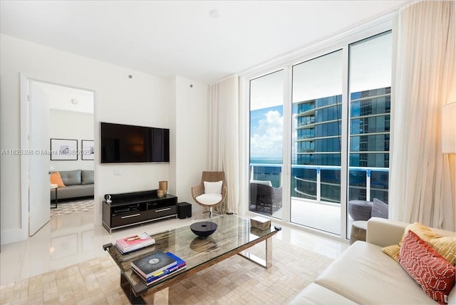 15811 Collins Ave Unit 1502, Sunny Isles Beach, FL 33160 - living room featuring tile patterned floors and a wall of windows