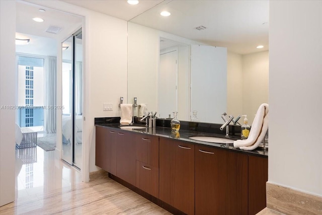 15811 Collins Ave Unit 1502, Sunny Isles Beach, FL 33160 - bathroom with double vanity and recessed lighting
