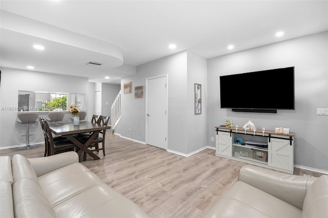 11000 Sand Piper Ct, Tamarac, FL 33321 - living area with stairway, light wood-type flooring, and recessed lighting