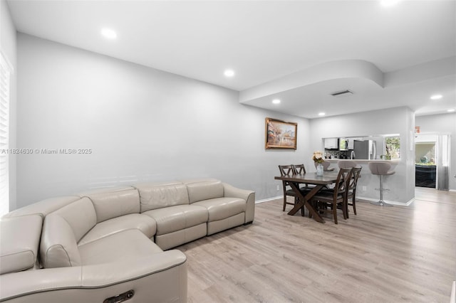 11000 Sand Piper Ct, Tamarac, FL 33321 - living area featuring light wood-type flooring and recessed lighting