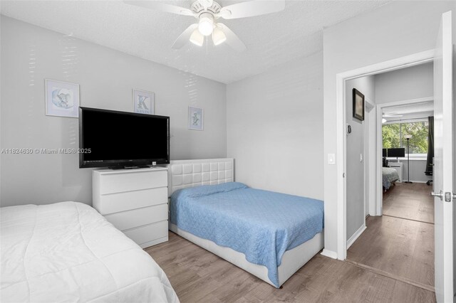 11000 Sand Piper Ct, Tamarac, FL 33321 - bedroom featuring wood finished floors and ceiling fan