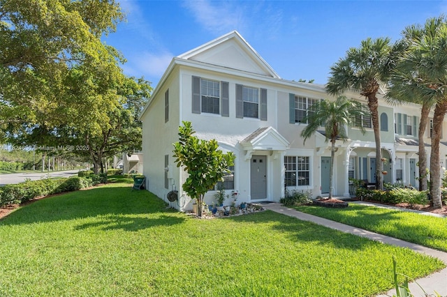 11000 Sand Piper Ct, Tamarac, FL 33321 - view of front of property featuring a front lawn and stucco siding