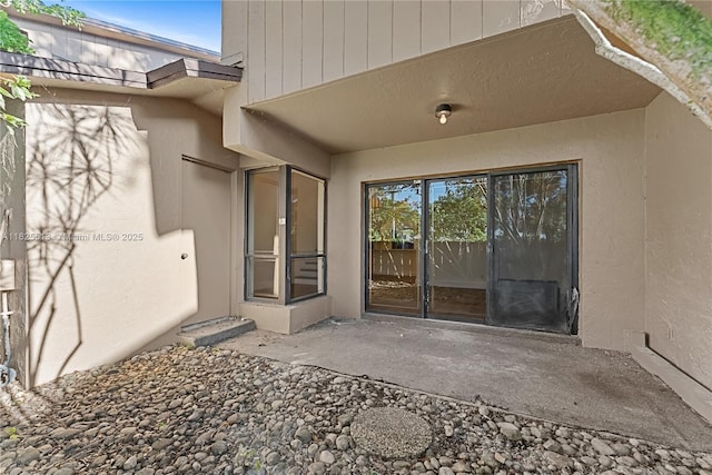 7720 NW 79th Ave Unit B6, Tamarac, FL 33321 - doorway to property with a patio area and stucco siding