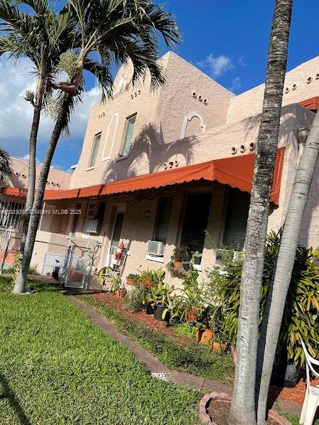 829 SW 19th Ave, Miami, FL 33135 - back of house featuring stucco siding