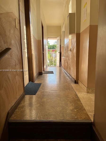 829 SW 19th Ave, Miami, FL 33135 - corridor with baseboards