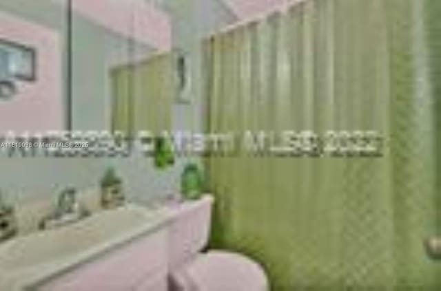 829 SW 19th Ave, Miami, FL 33135 - bathroom with toilet and vanity