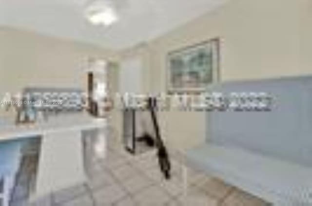 829 SW 19th Ave, Miami, FL 33135 - kitchen with tile patterned flooring