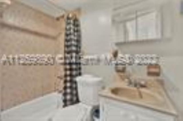 829 SW 19th Ave, Miami, FL 33135 - bathroom featuring vanity and toilet