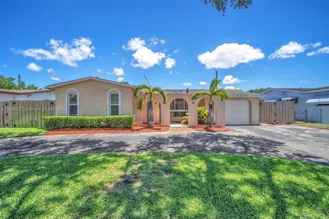 9200 SW 54th St, Cooper City, FL 33328 - view of front of property with driveway, stucco siding, and a garage
