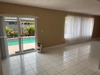 9200 SW 54th St, Cooper City, FL 33328 - unfurnished room with light tile patterned floors
