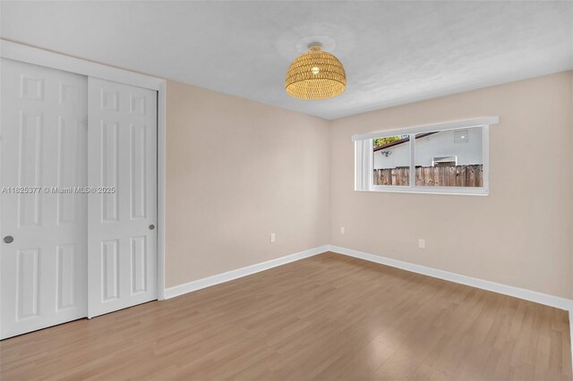 9200 SW 54th St, Cooper City, FL 33328 - unfurnished bedroom with wood finished floors and a closet
