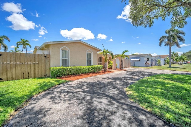 9200 SW 54th St, Cooper City, FL 33328 - view of front of property with stucco siding and driveway