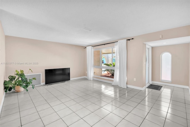 9200 SW 54th St, Cooper City, FL 33328 - unfurnished living room with baseboards and light tile patterned floors