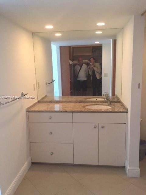 3375 N Country Club Dr Unit 1508, Aventura, FL 33180 - bathroom featuring vanity, tile patterned floors, and recessed lighting