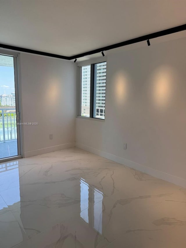 800 N Miami Ave Unit E-901, Miami, FL 33136 - spare room with light marble finish flooring and baseboards