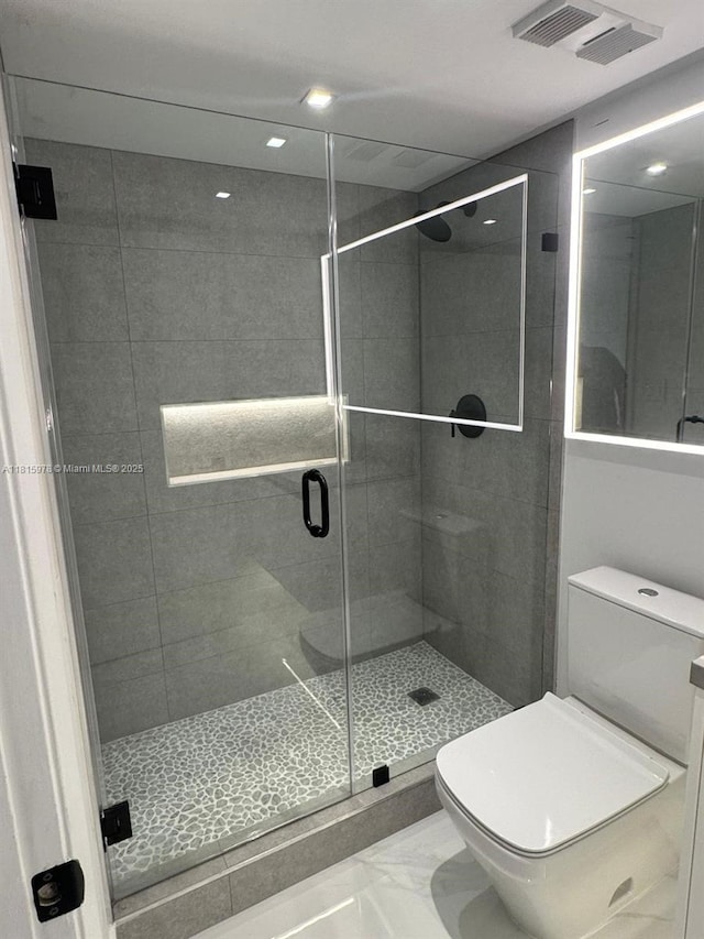 800 N Miami Ave Unit E-901, Miami, FL 33136 - bathroom with a stall shower, marble finish flooring, and recessed lighting