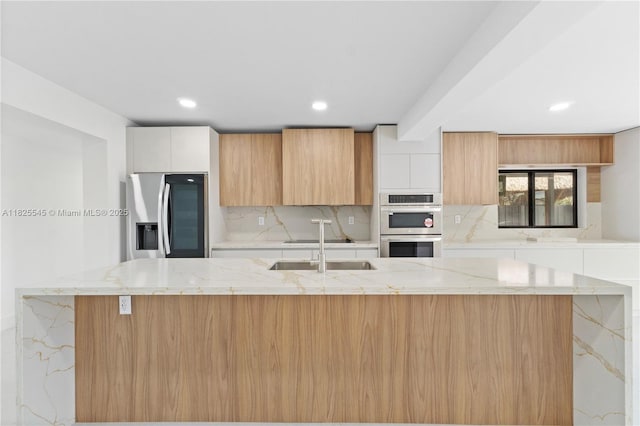 2231 N 49th Ave, Hollywood, FL 33021 - kitchen with stainless steel appliances, backsplash, recessed lighting, modern cabinets, and a center island with sink