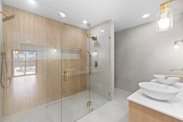 2231 N 49th Ave, Hollywood, FL 33021 - full bathroom featuring a shower stall, double vanity, and recessed lighting