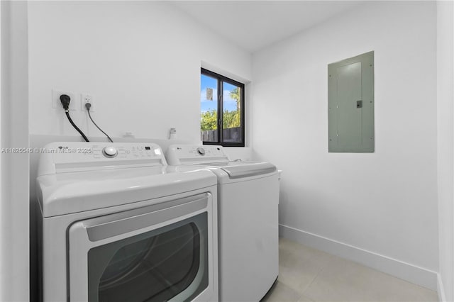 2231 N 49th Ave, Hollywood, FL 33021 - laundry area with electric panel, independent washer and dryer, and light tile patterned floors