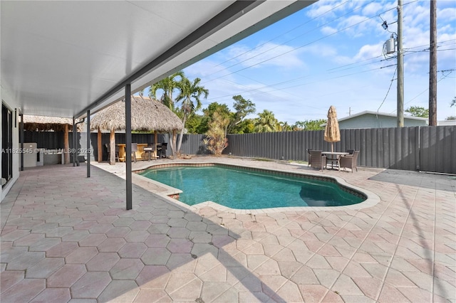2231 N 49th Ave, Hollywood, FL 33021 - view of pool featuring a patio, a fenced backyard, and outdoor dining space