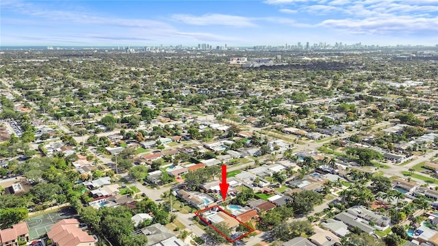 2231 N 49th Ave, Hollywood, FL 33021 - aerial view of property and surrounding area featuring city skyline and property parcel outlined